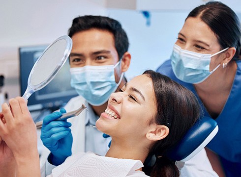 Patient in Corpus Christi smiling with dental implants